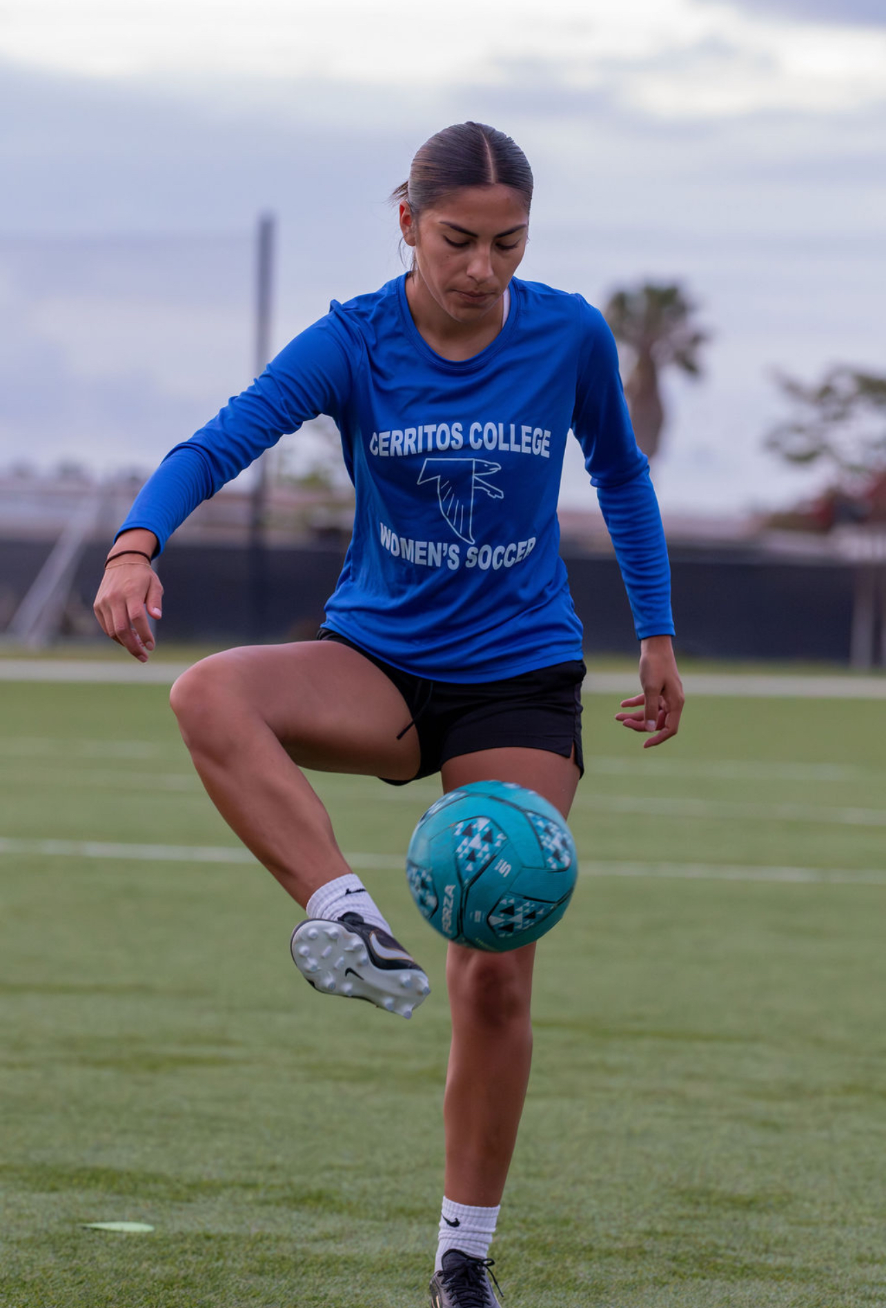Player juggling the ball on the field